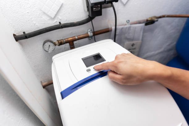Programming pressurized water softeners in a home shed Sanitaires - Bordeaux Confort Énergie - BCE